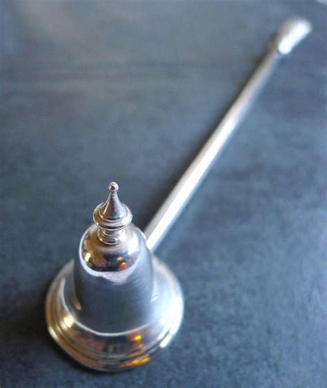 Antique Sterling Silver Candle Snuffer for sale .